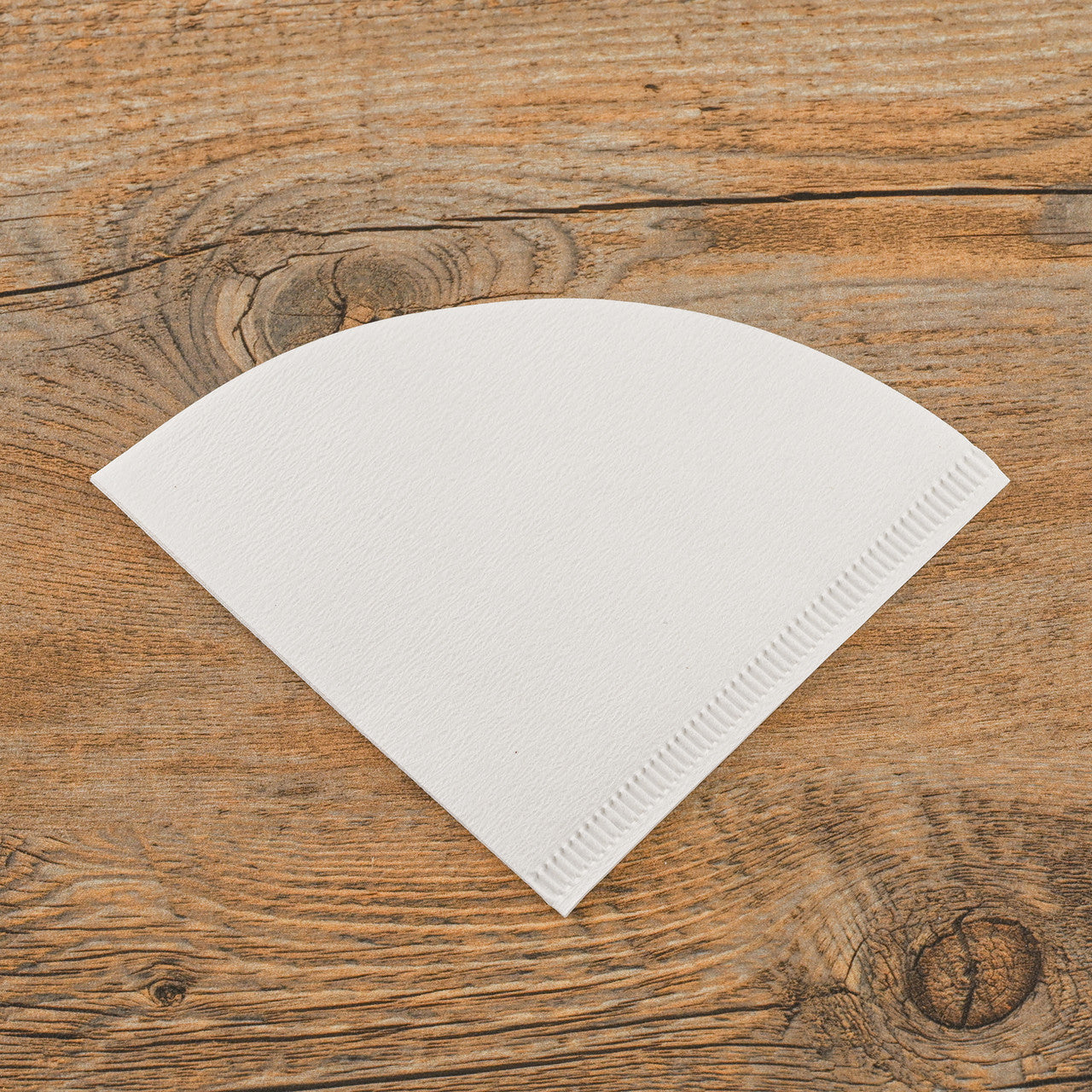 Paper Filter for Cone Dripper, White, 100 pieces, size 01 filter on wooden table, PF-100W Select Brands